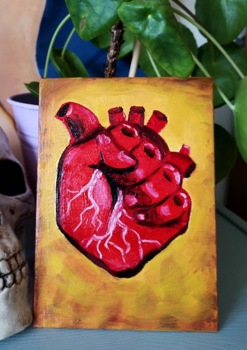 oil painting of anatomical heart that's also a clenched fist